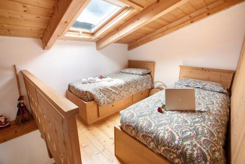 Katil atau katil-katil dalam bilik di Taulain Gotrosio