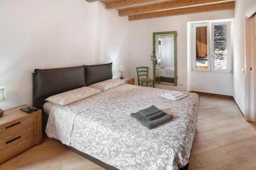 Una cama o camas en una habitación de Thari House Como Lake