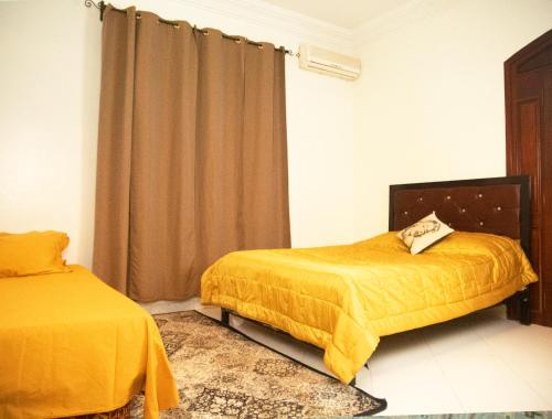 Villa Sabah房間的床