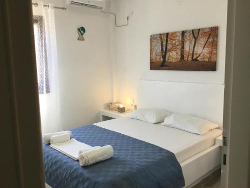 Ένα ή περισσότερα κρεβάτια σε δωμάτιο στο VILLA LEMONIA