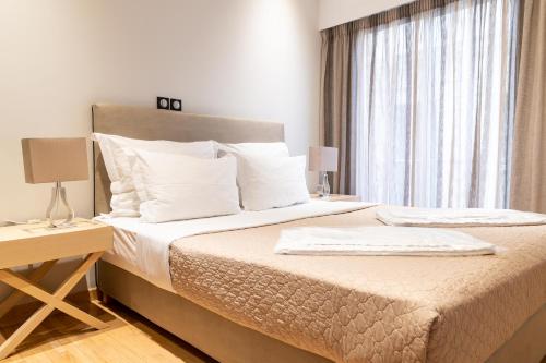 Posteľ alebo postele v izbe v ubytovaní Plaka Sweet House 1