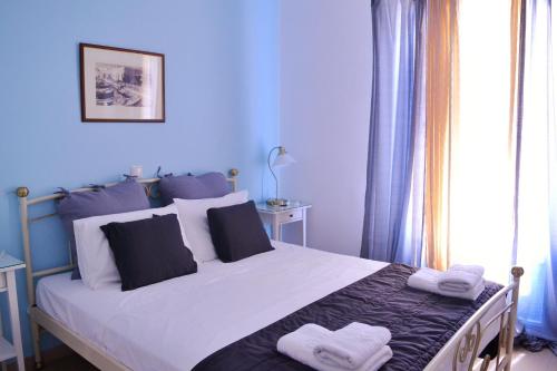 Posteľ alebo postele v izbe v ubytovaní Mer Bleu Apartments