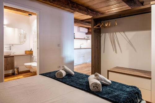 Postel nebo postele na pokoji v ubytování Boznerhütte - La Baita Bolzano