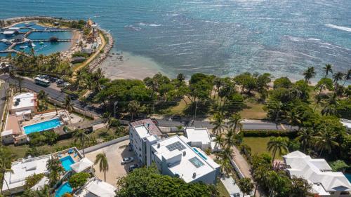 an aerial view of a resort and the ocean at Skylight Suites Hotel in San Felipe de Puerto Plata