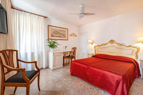 Un ou plusieurs lits dans un hébergement de l'établissement San Luca Flats