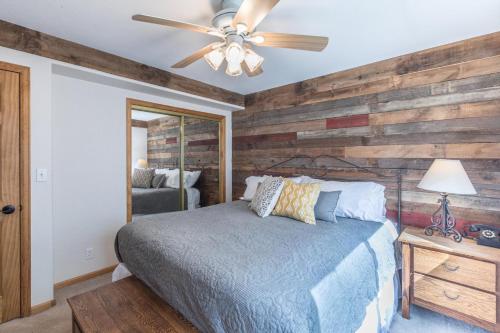 a bedroom with a bed and a ceiling fan at 1486 Oak- Grandview in Ouray