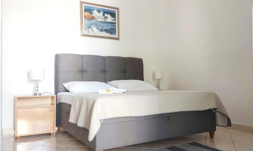 Posteľ alebo postele v izbe v ubytovaní Apartment Biokovo