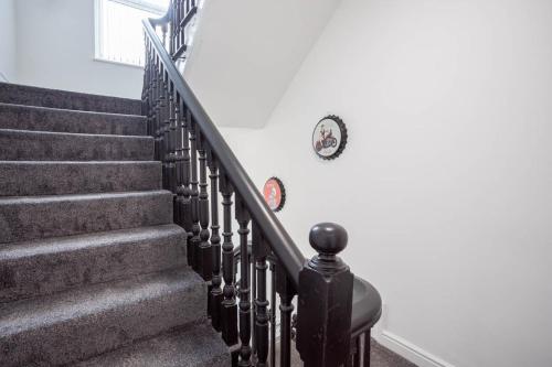 a set of stairs in a house at Dusties Hotel in Rotherham