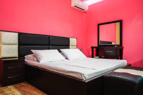 Ein Bett oder Betten in einem Zimmer der Unterkunft Hotel Magic