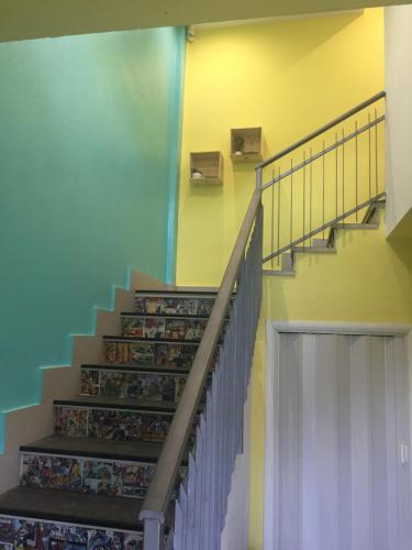a staircase in a building with a stair case at Da Tosca in Gravellona Toce
