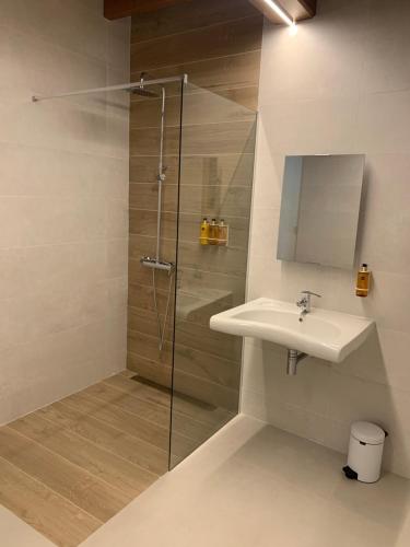 a bathroom with a sink and a shower at Mar De Muros in Muros