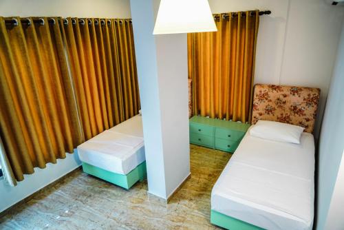 Posteľ alebo postele v izbe v ubytovaní Hotel Magic