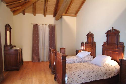 Кровать или кровати в номере Al Podere Santa Cristina