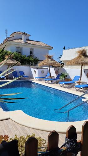 Bazén v ubytování Hostal Casa Arco Iris (Playa) nebo v jeho okolí