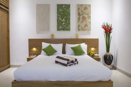A bed or beds in a room at Villa Leda