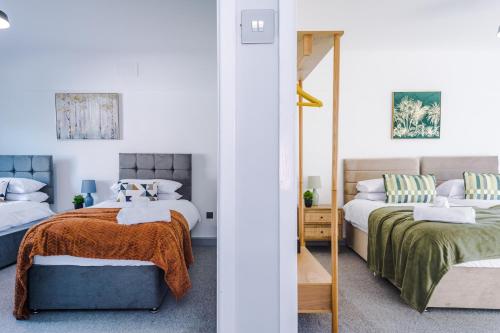 Ένα ή περισσότερα κρεβάτια σε δωμάτιο στο Premium 3-Bed Detached by Papermill, Deeside - Wirral