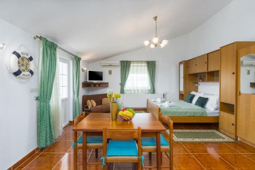 Posteľ alebo postele v izbe v ubytovaní Studio Apartmani Marcela
