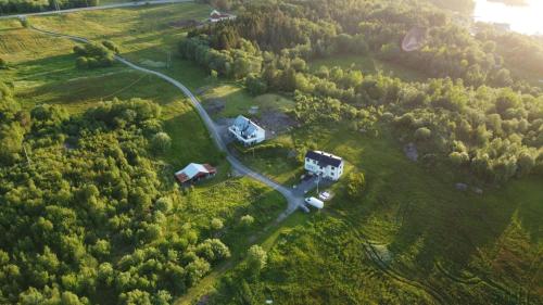 an aerial view of a house and a road at Leite Telt Camping in Lyngstad