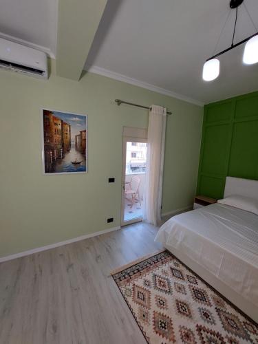 Katil atau katil-katil dalam bilik di Vila TAFA Apartments