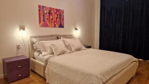 En eller flere senger på et rom på Karlo