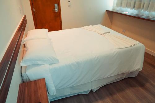 Cama ou camas em um quarto em Hotel Imperial de Quatro Barras