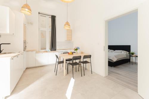 Posteľ alebo postele v izbe v ubytovaní Maison de Fashion Apartment