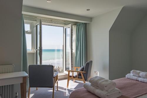 Katil atau katil-katil dalam bilik di Sun Beach House