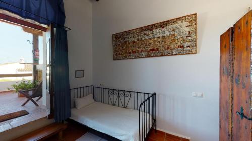 Postel nebo postele na pokoji v ubytování El Palomar de la Breña