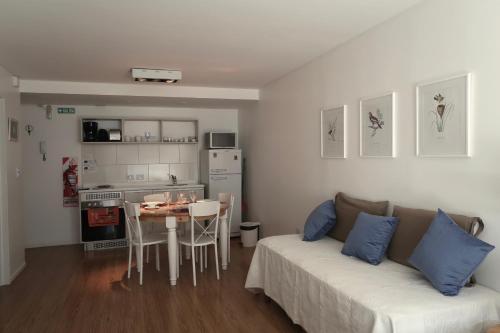 a living room with a couch and a table at Ona Shelter in Ushuaia