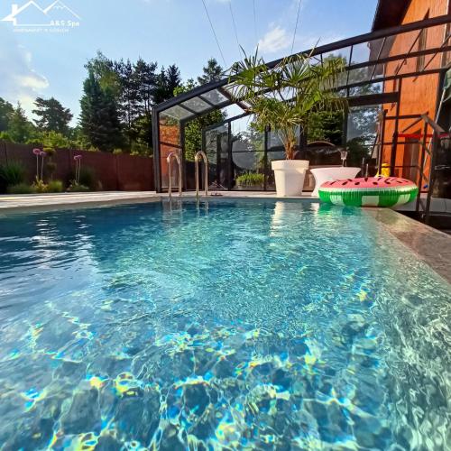 Bazén v ubytování Apartamenty koło Szczyrku A&S Spa - basen, jacuzzi, sauna nebo v jeho okolí