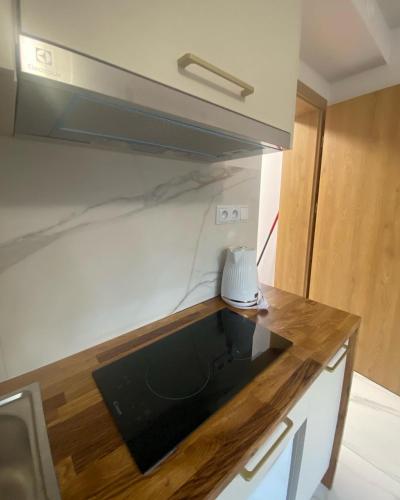 Η κουζίνα ή μικρή κουζίνα στο Apartamenty i pokoje nowomiejska 119