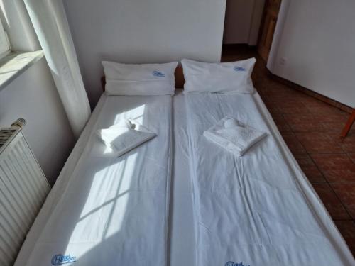 Postel nebo postele na pokoji v ubytování Apartamenty Hexagon nr16