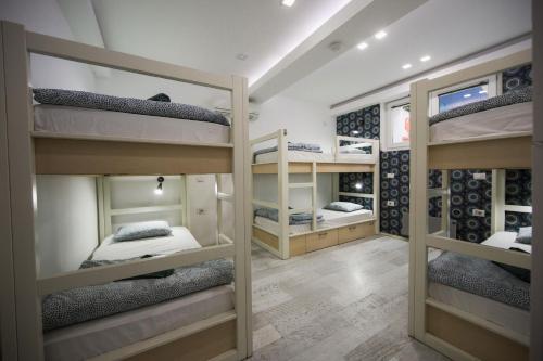 Posteľ alebo postele v izbe v ubytovaní Hostel Bongo