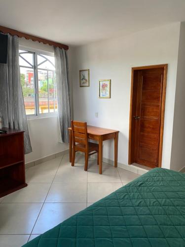 Postel nebo postele na pokoji v ubytování Casa Lolita