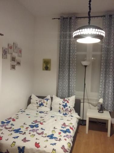 Posteľ alebo postele v izbe v ubytovaní Apartament