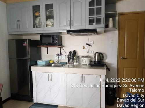 Η κουζίνα ή μικρή κουζίνα στο ENTIRE 2BR CONDO UNIT@8 SPATIAL CONDOMINIUM