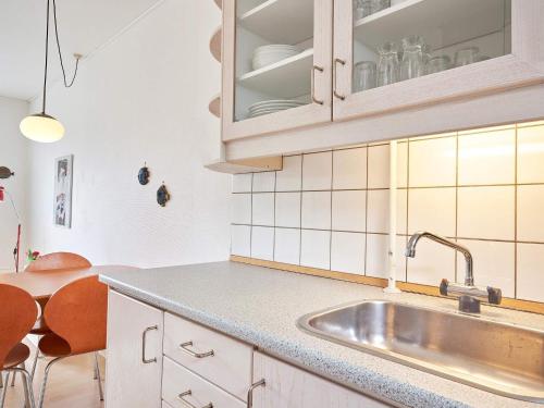 a kitchen with a sink and a counter top at 2 person holiday home in Aakirkeby-By Traum in Vester Sømarken