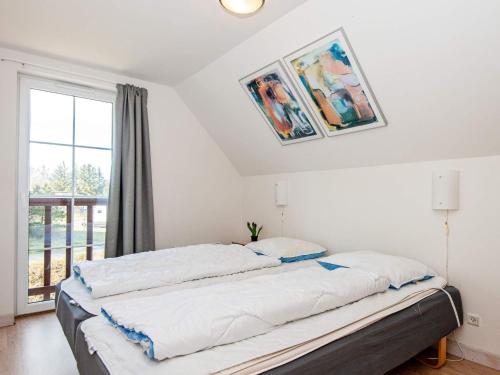Katil atau katil-katil dalam bilik di Holiday home Rømø CXXV