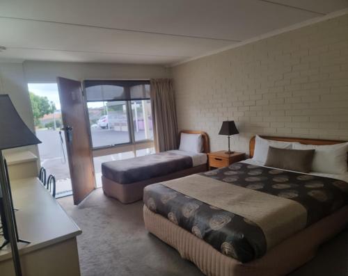 Letto o letti in una camera di Hacienda Motel Geelong