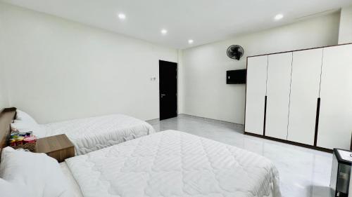 Ένα ή περισσότερα κρεβάτια σε δωμάτιο στο Cô Ba Homestay