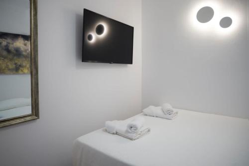 Posteľ alebo postele v izbe v ubytovaní Casa Blu Mykonos