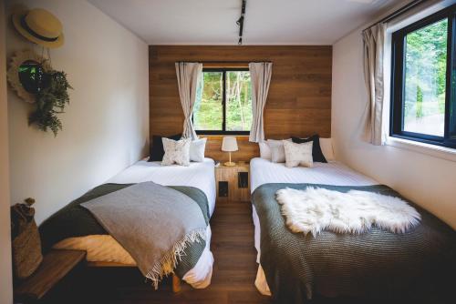 Postel nebo postele na pokoji v ubytování SAUNA FOREST CABIN 軽井沢 御代田　MORI-ASOBI