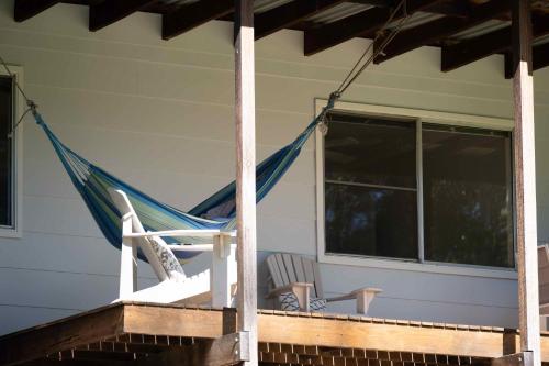 a hammock on the porch of a house at Yarramie in Mount View