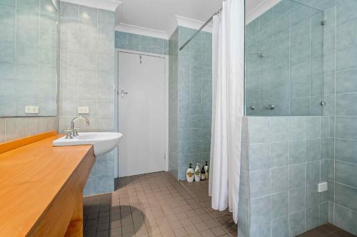 a bathroom with a sink and a shower at Yarramie in Mount View
