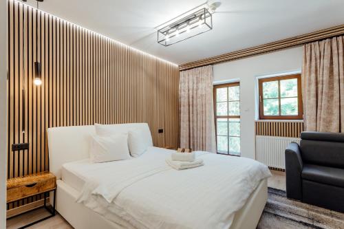 Postel nebo postele na pokoji v ubytování Hotel Marlene