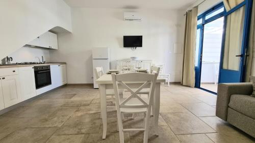 Gallery image of Lido Marini Seahouses in Lido Marini
