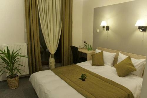 Cama o camas de una habitación en Hotel Vis A Vis