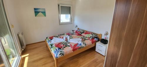 Apartment Summer Dream tesisinde bir odada yatak veya yataklar