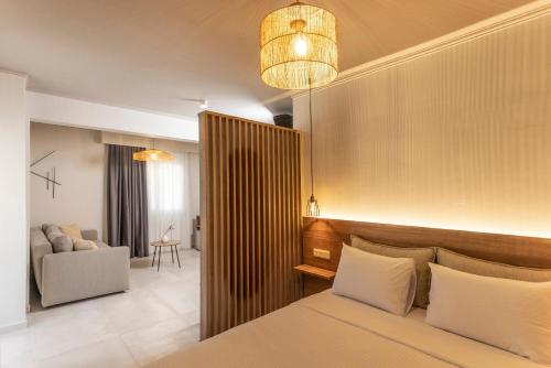 Ένα ή περισσότερα κρεβάτια σε δωμάτιο στο Noemie Premium Holiday Apartments