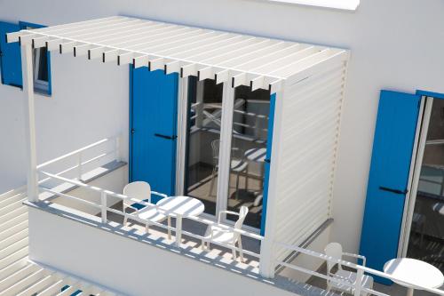 Palanda nebo palandy na pokoji v ubytování Villa Pellio Apartmani